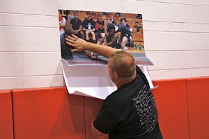 [Photo Tex poster being mounted]